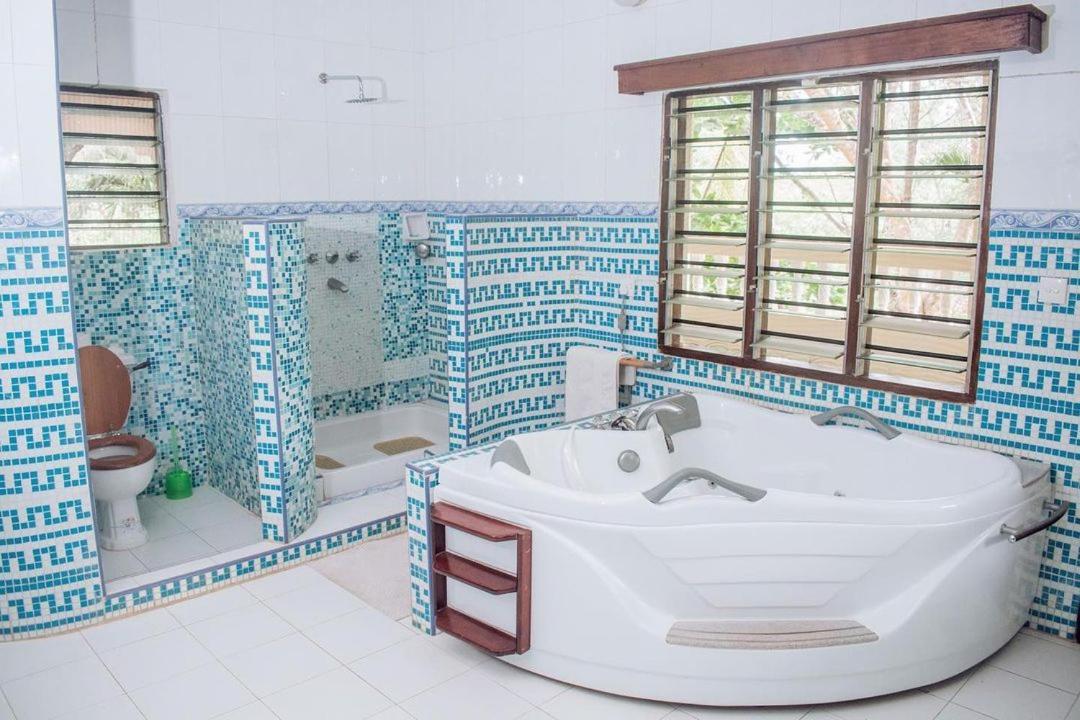 Kijani Cottages Diani Диани-Бич Экстерьер фото