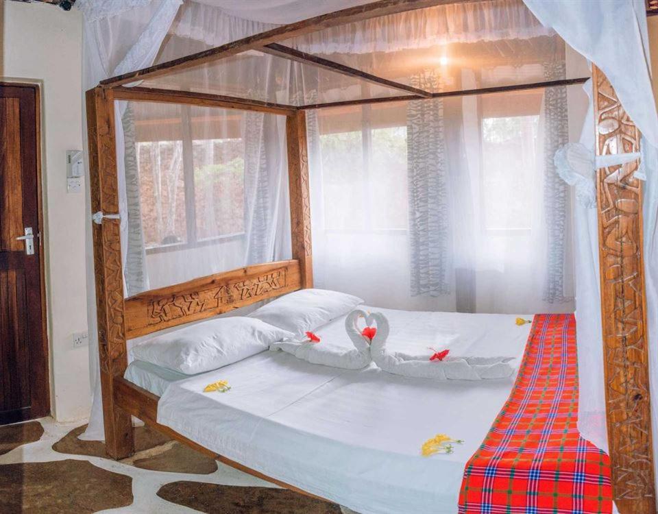 Kijani Cottages Diani Диани-Бич Экстерьер фото