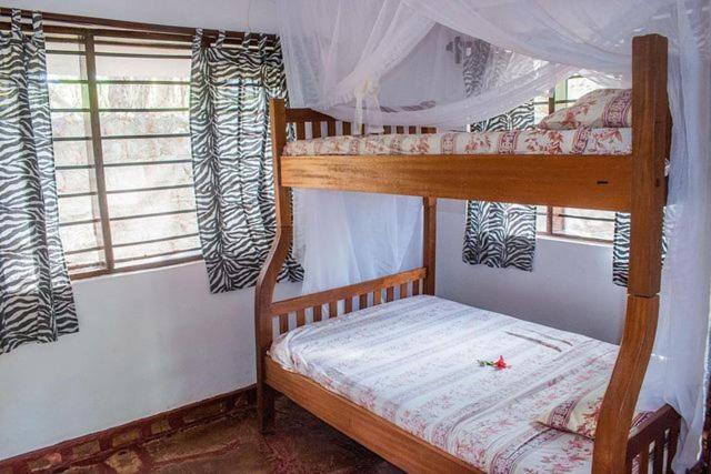 Kijani Cottages Diani Диани-Бич Экстерьер фото