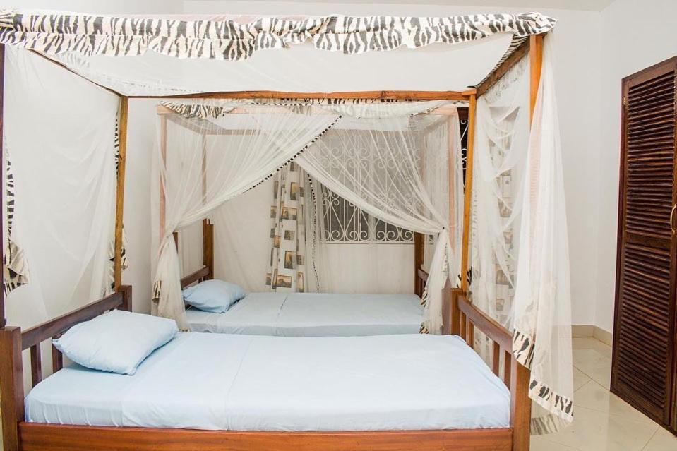 Kijani Cottages Diani Диани-Бич Экстерьер фото